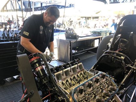 crew team working on matt hagan's funny car