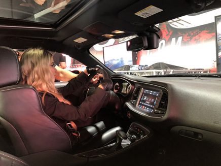 carmen electra in a dodge srt demon simulator