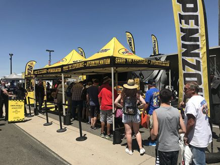 people lined up at a booth