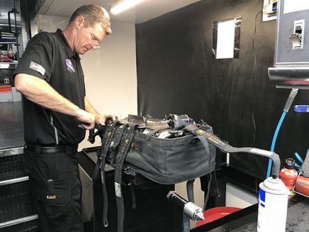 crew working inside jack beckman's trailer