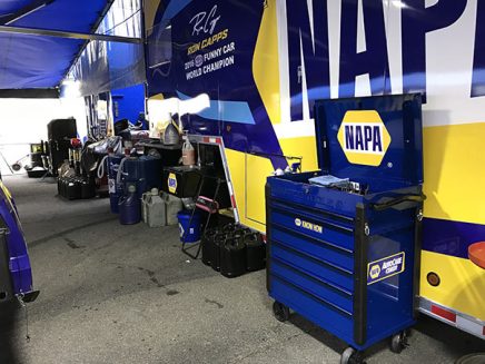 tools and vehicle parts inside ron capps' pit area