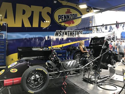 crew working on ron capps' funny car