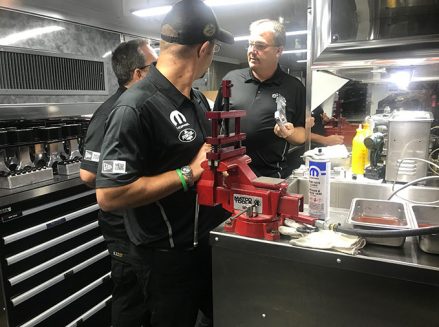 crew members working in leah pritchett's trailer