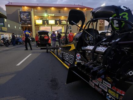 top fuel dragtser being transported to the drag strip