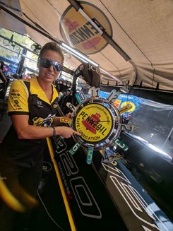 leah pritchett with a pennzoil sign