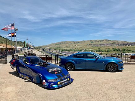 2020 dodge charger srt hellcat widebody funny car next to a 2020 charger srt hellcat widebody