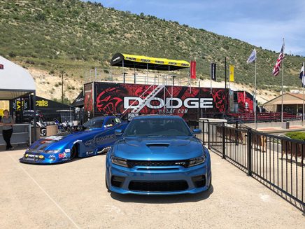 2020 dodge charger srt hellcat widebody funny car next to a 2020 charger srt hellcat widebody