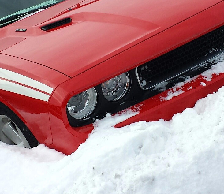 dodge vehicle parked in snow