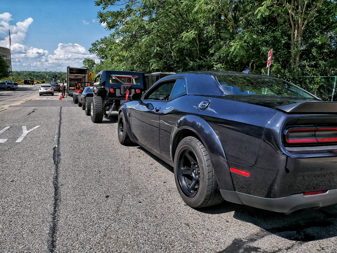 vehicles lined up along the street