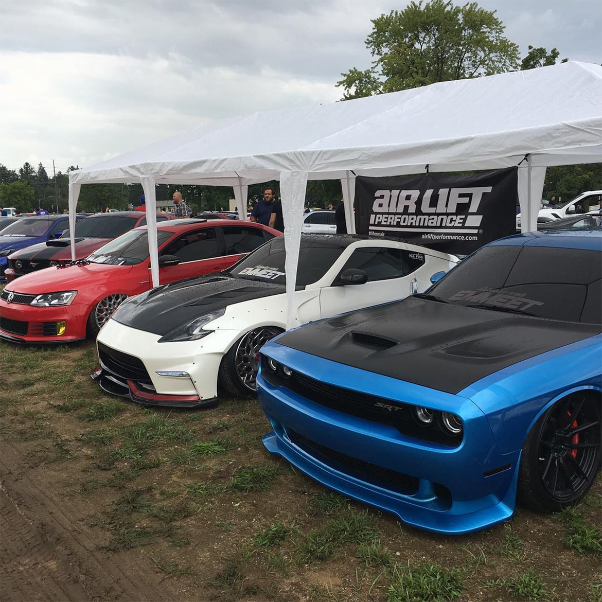 dodge vehicles parked inn a row outside