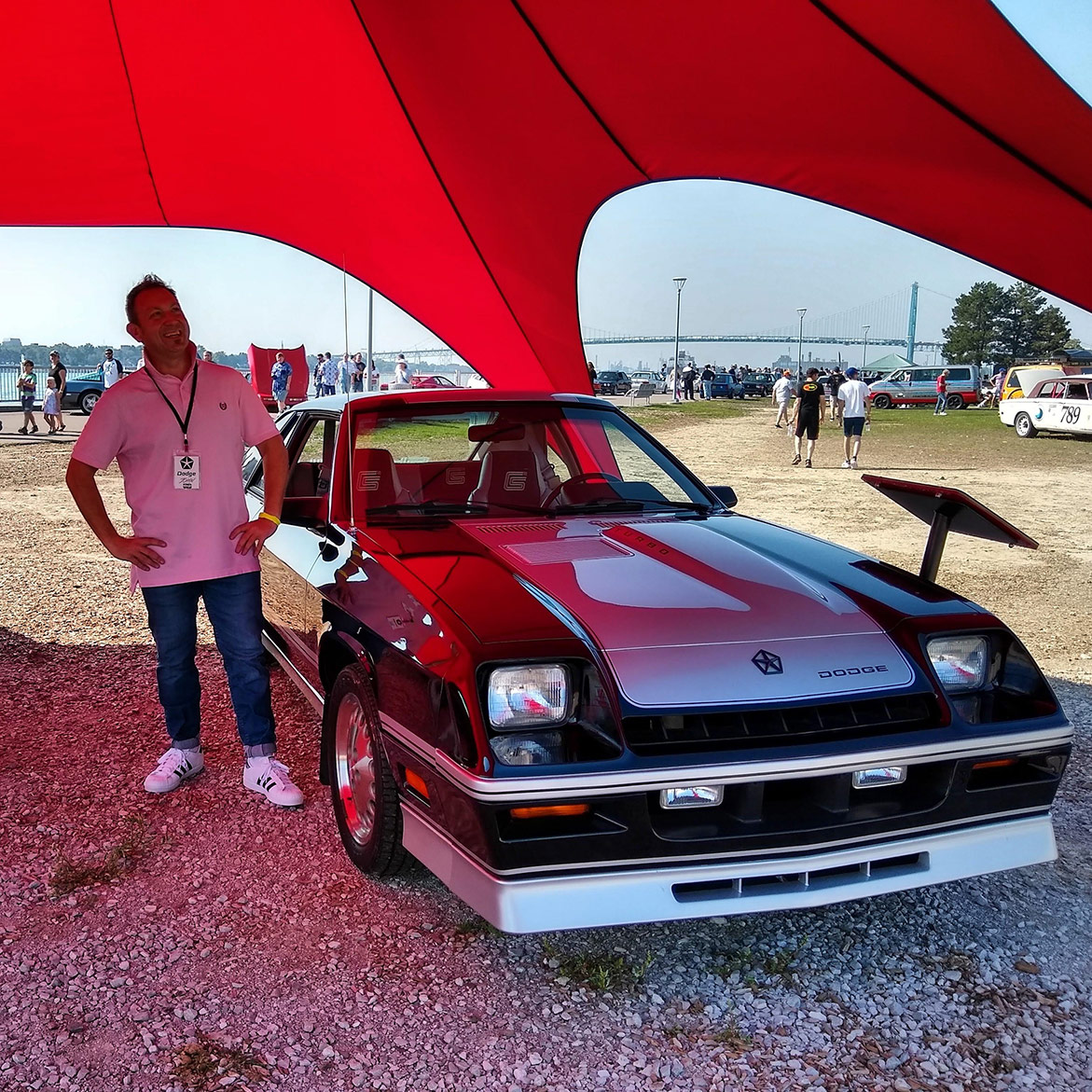 man with a 1995 Dodge Shelby Charger