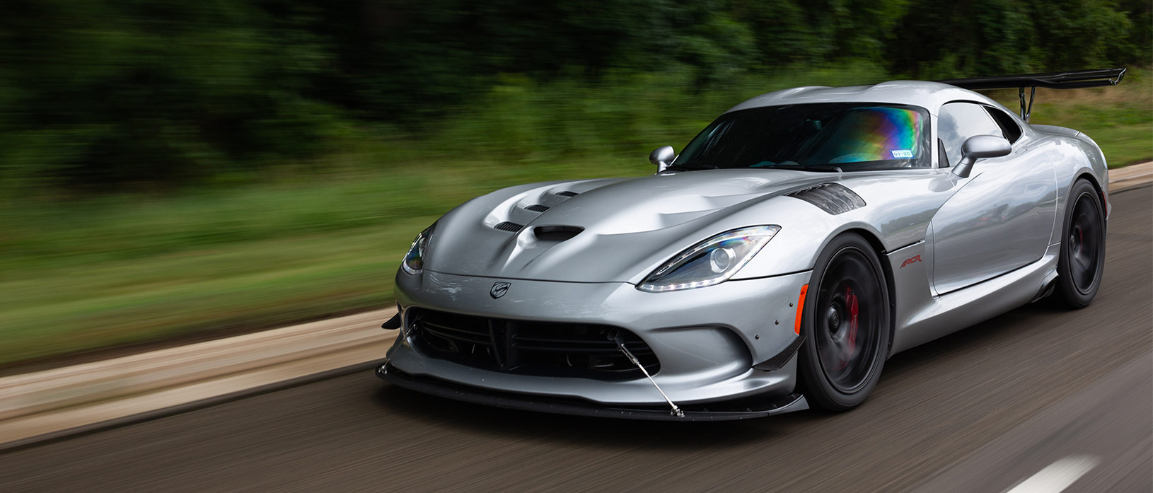 Dodge Viper ACRe driving down the road