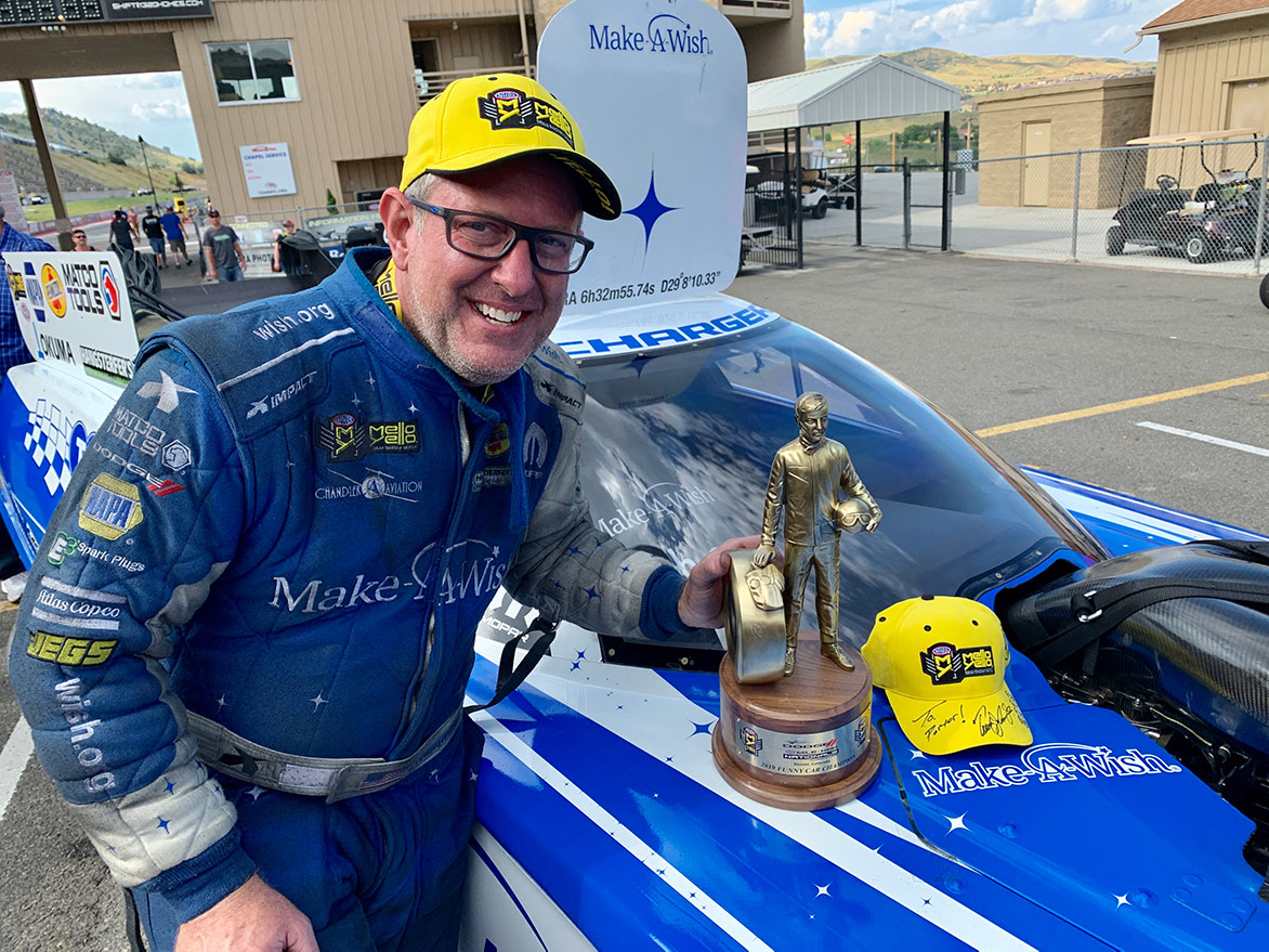 Tommy Johnson Jr with a wally trophy