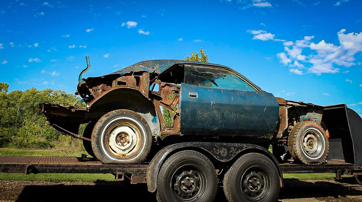 decrepit plymouth vehicle