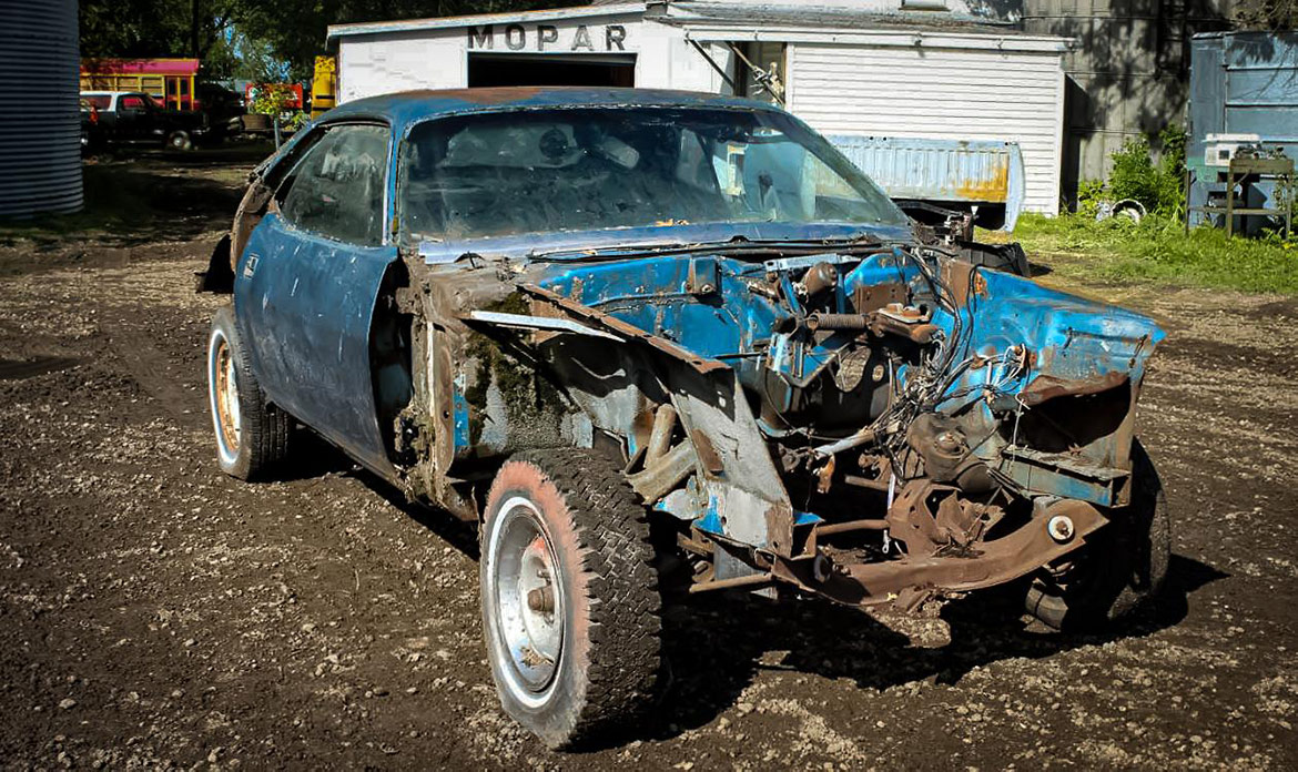 decrepit plymouth vehicle