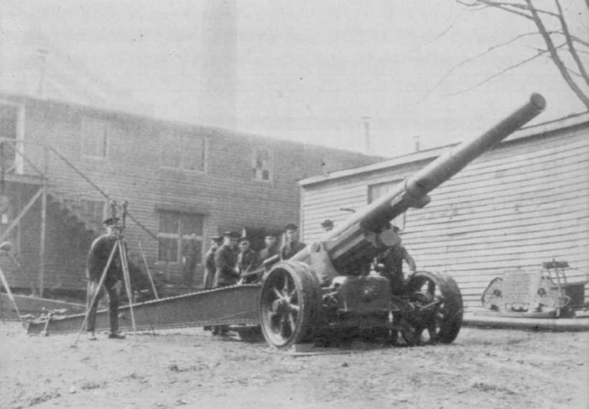 men standing around cannon