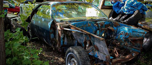 decrepit plymouth vehicle