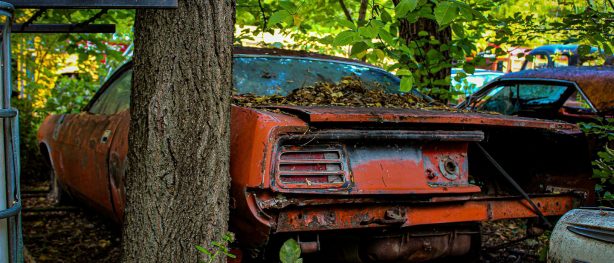 decrepit plymouth vehicle