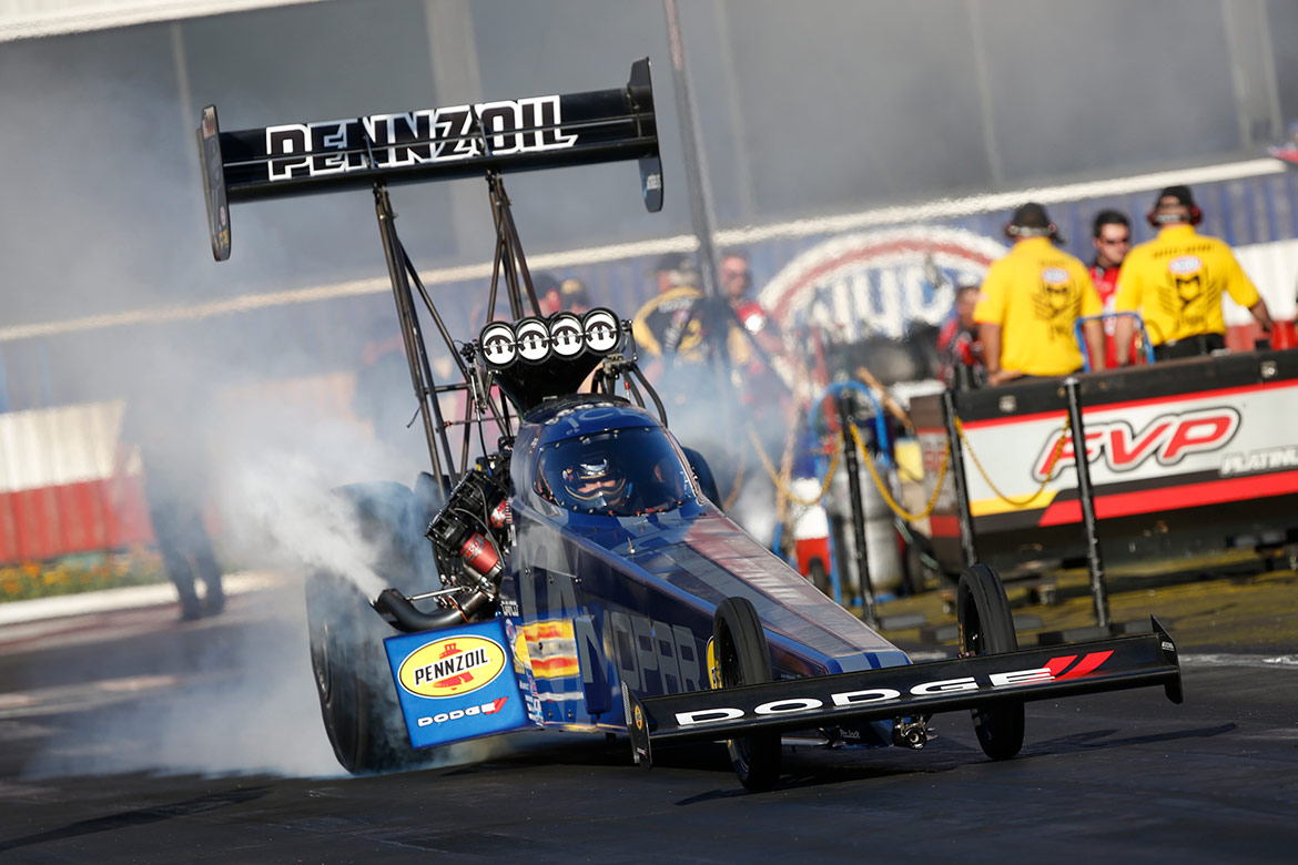 top fuel dragster on the drag strip