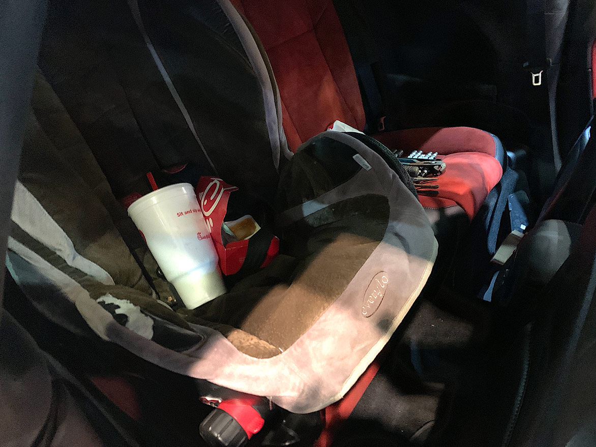 car seat and trash