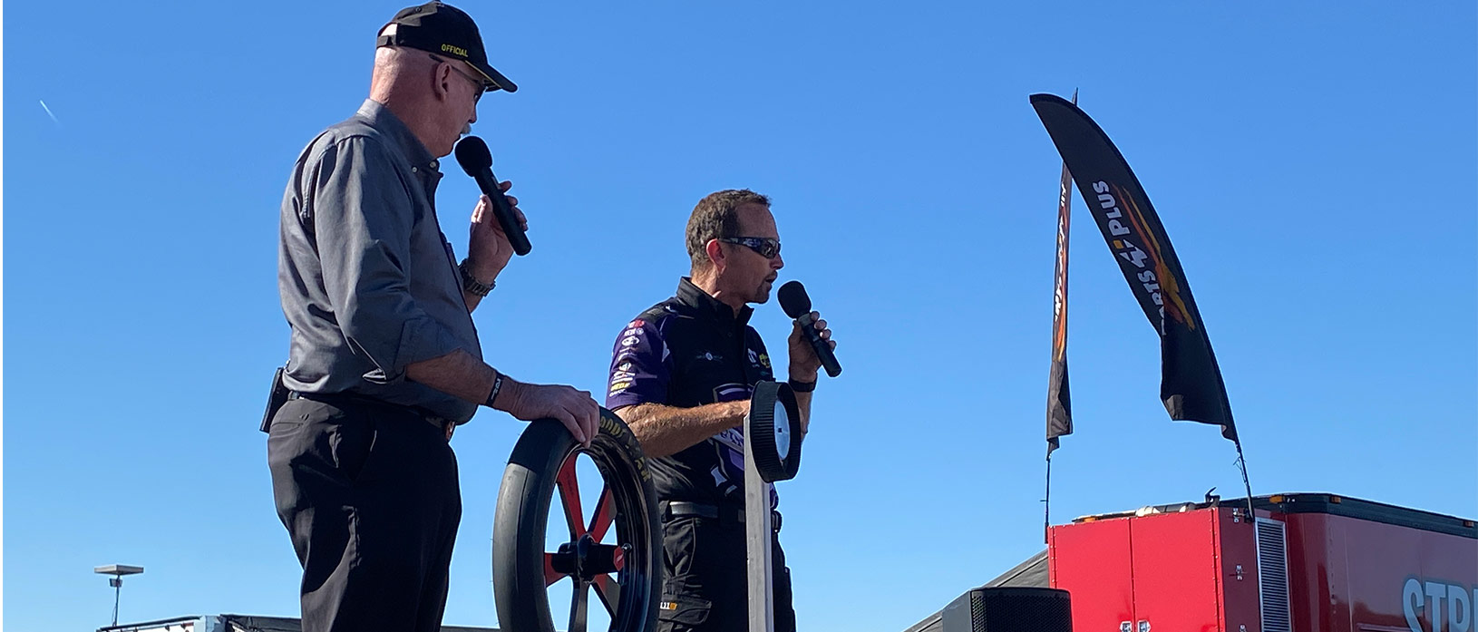 jack beckman and alan reinhart addressing a crowd