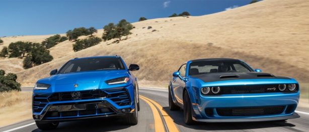 a Lamborghini Urus and a Dodge Challenger Hellcat Redeye driving side by side