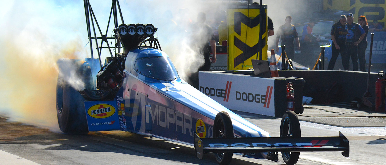 top fuel dragster doing a burnout