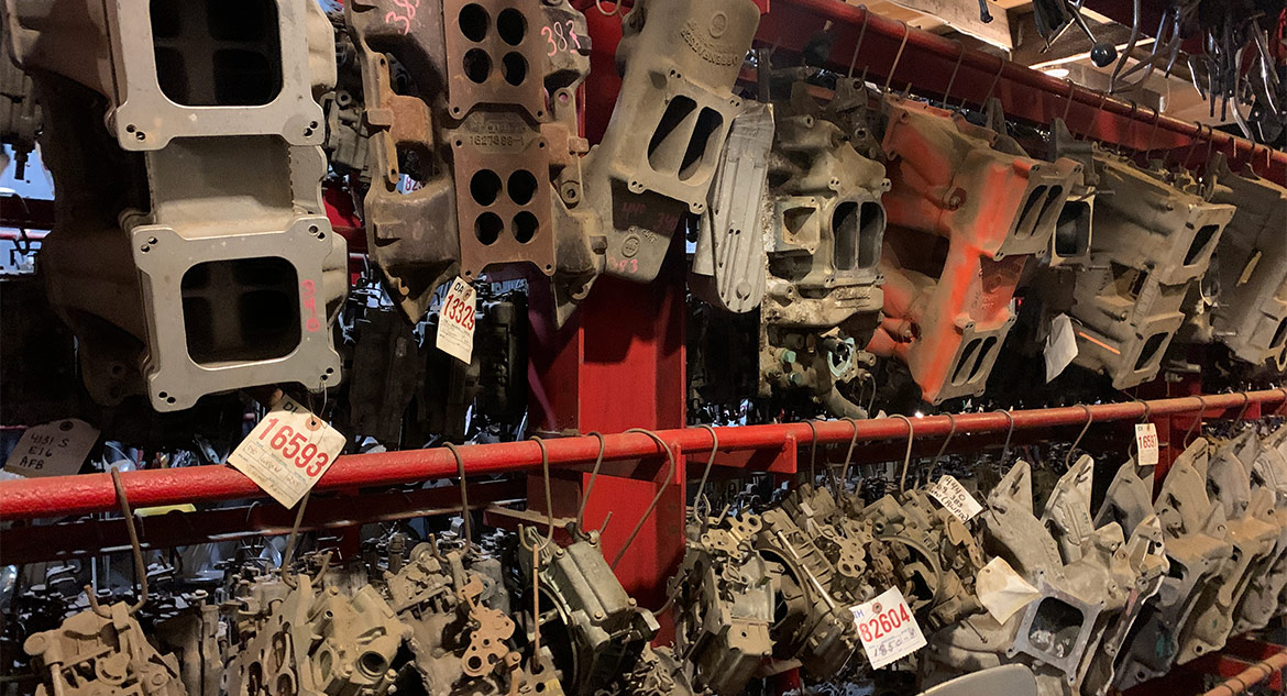 car parts on display in junkyard