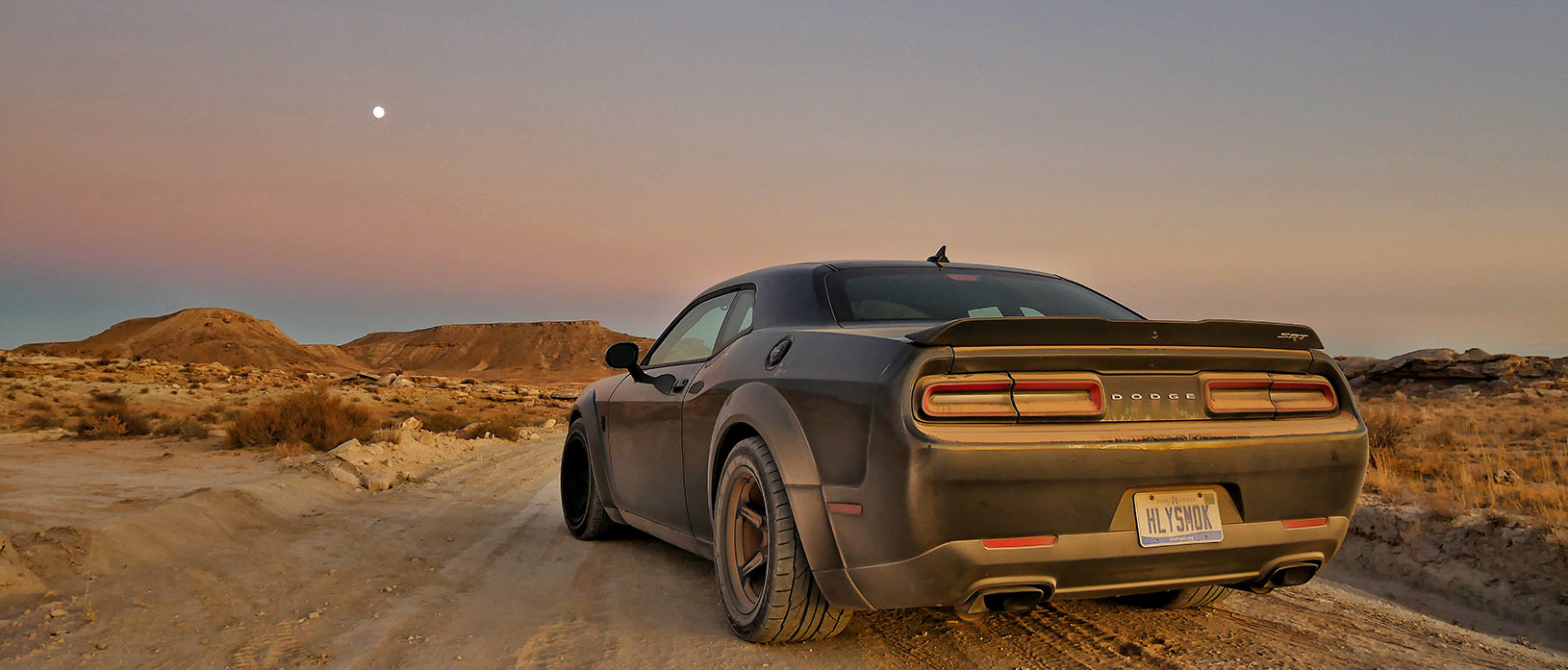 dirty Challenger SRT Demon on a dirt road