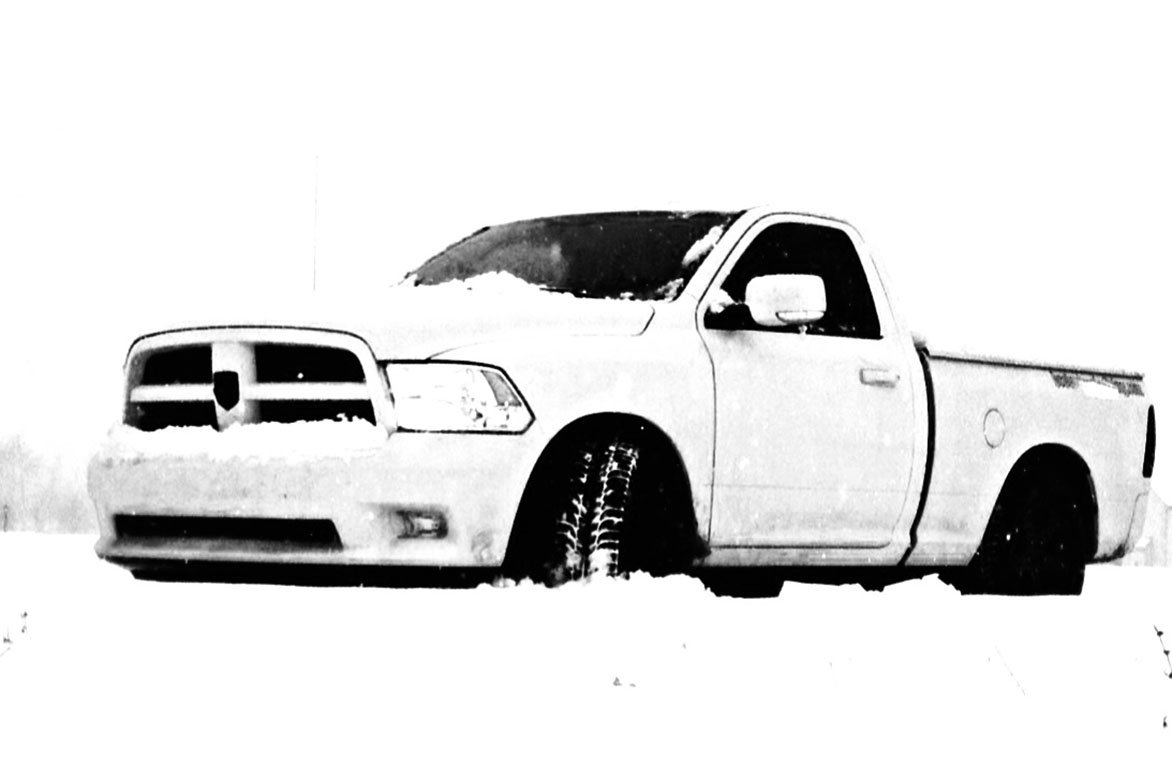 Dodge RAM parked in front of snow bank