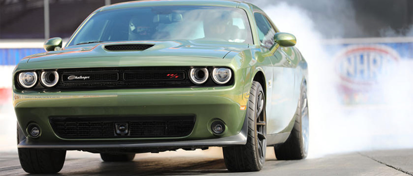 dodge challenger doing a burnout