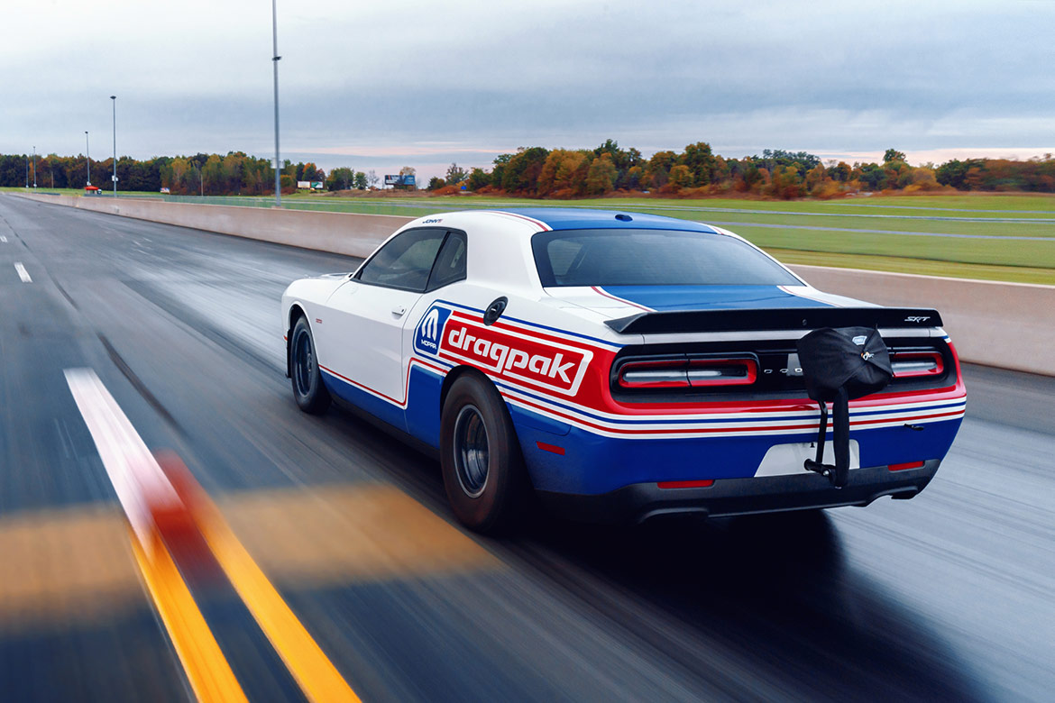 mopar dodge drag pak driving down a drag strip