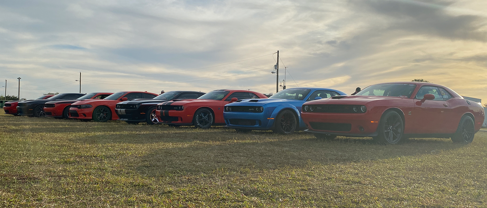 dodge vehicles lined up at sunset