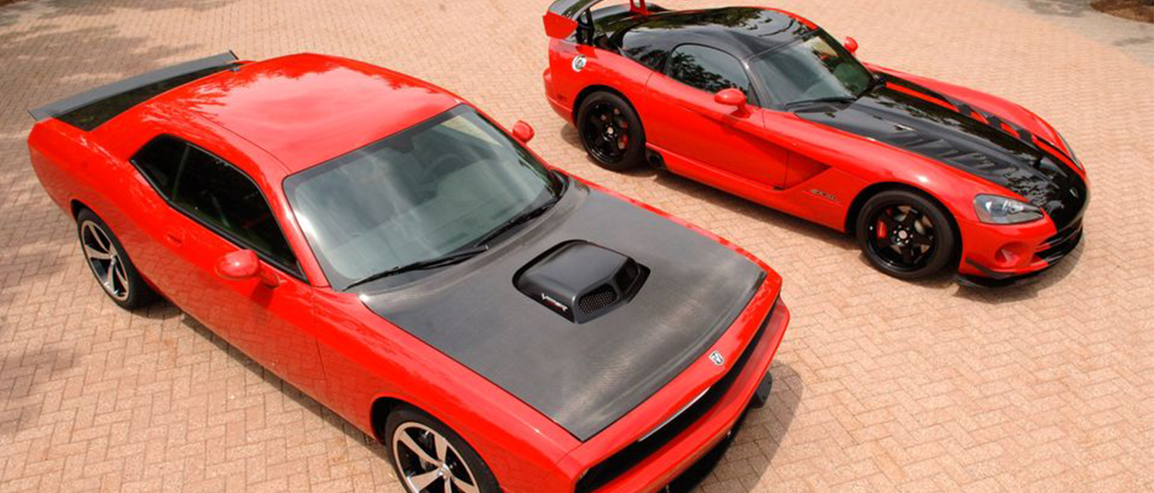 Dodge Viper parked next to a Dodge Challenger