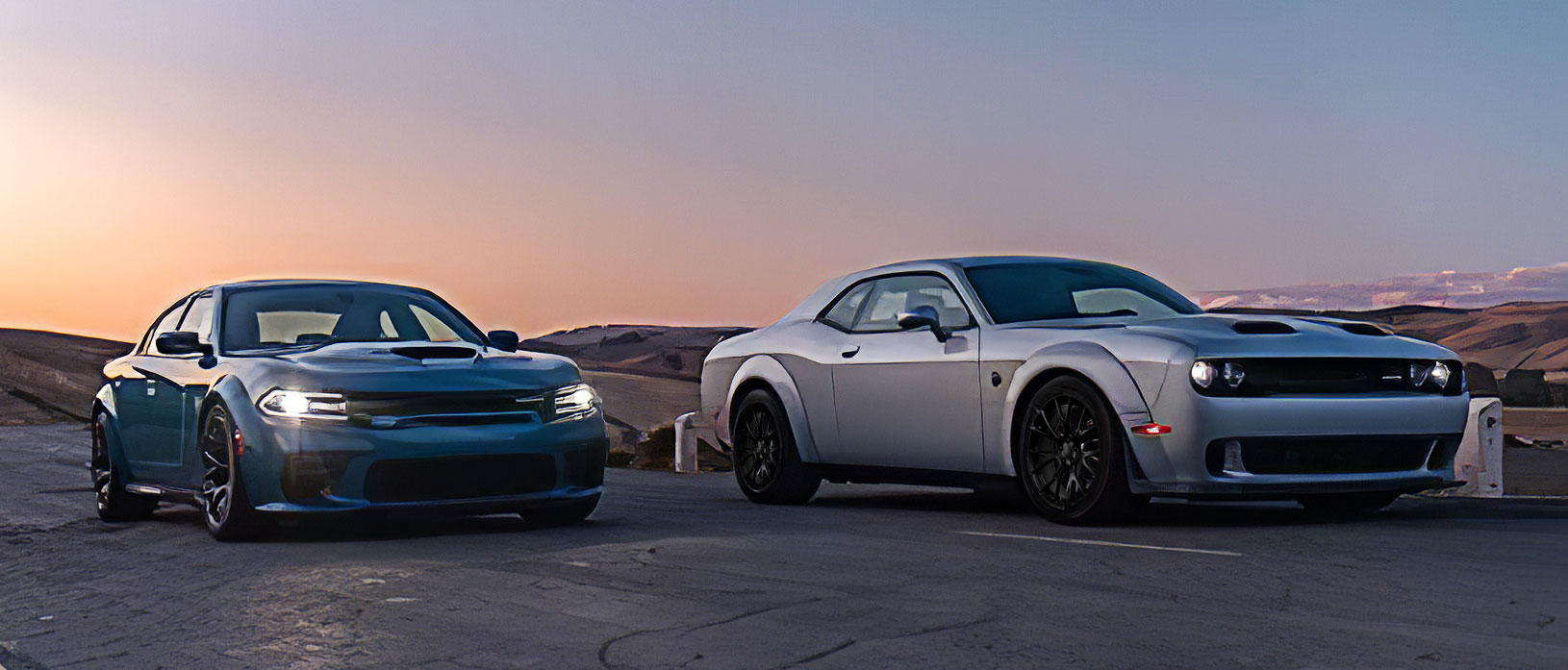 Challenger and Charger driving with sunset in the background