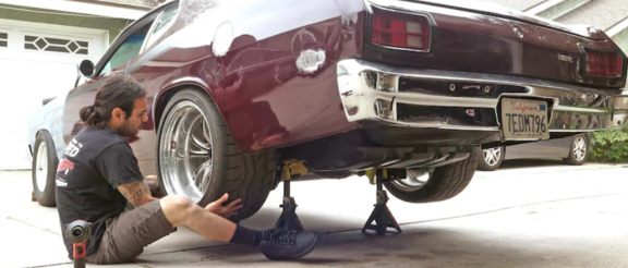 man working on a vehicle