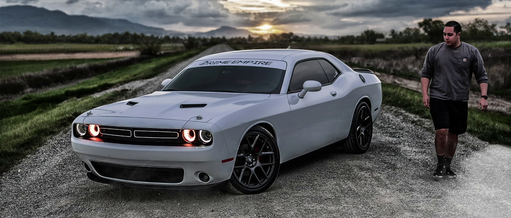 Man standing beside his Challenger