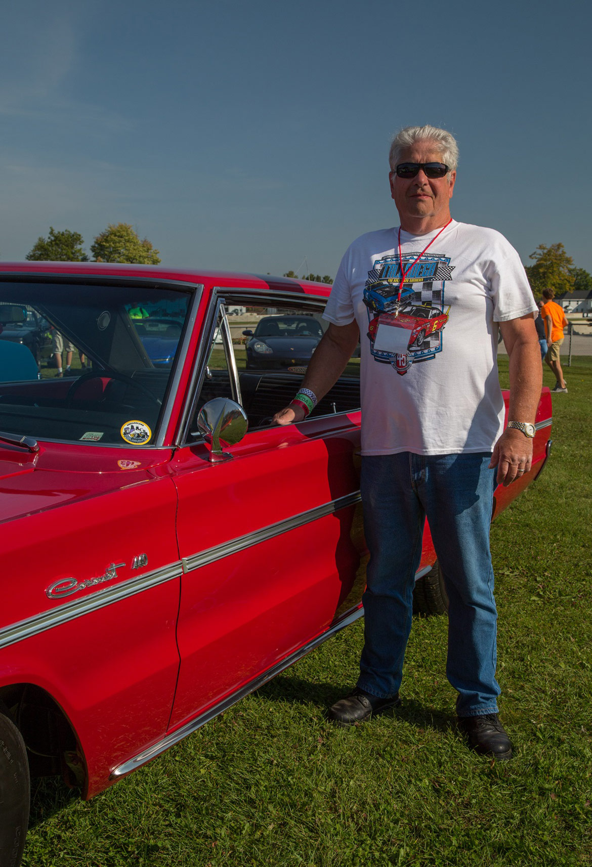 man standing with a vehicle