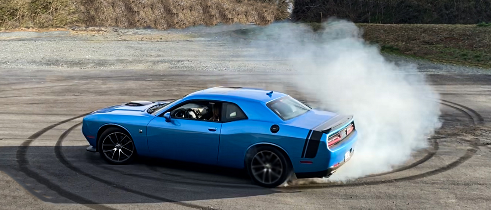 National Police Week: Young racer delivers donuts in a Dodge Challenger and celebrates with a few “donuts” of her own