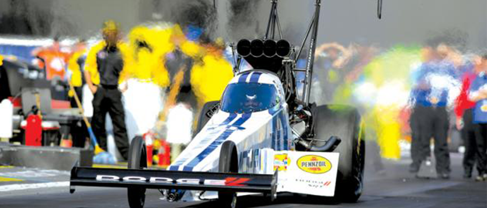 top fuel dragster on a drag strip