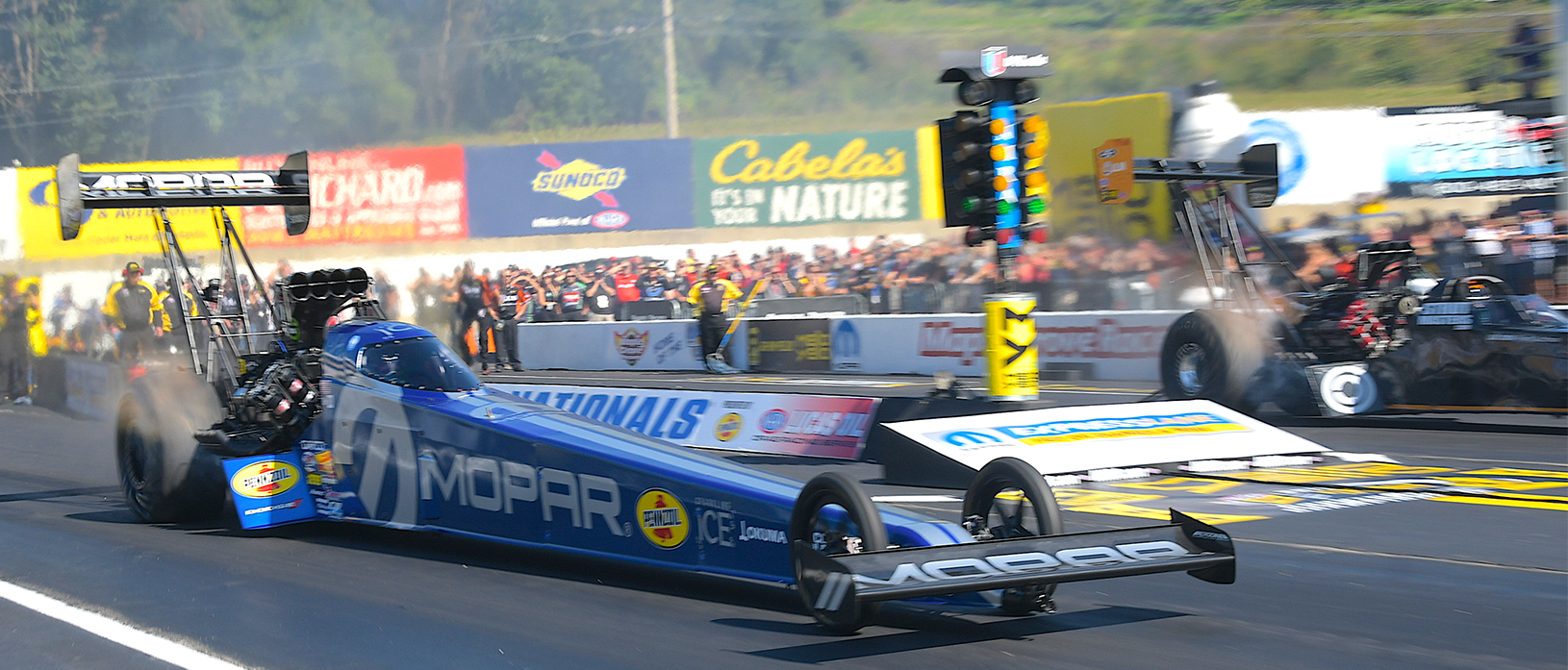 top fuel dragster on a drag strip