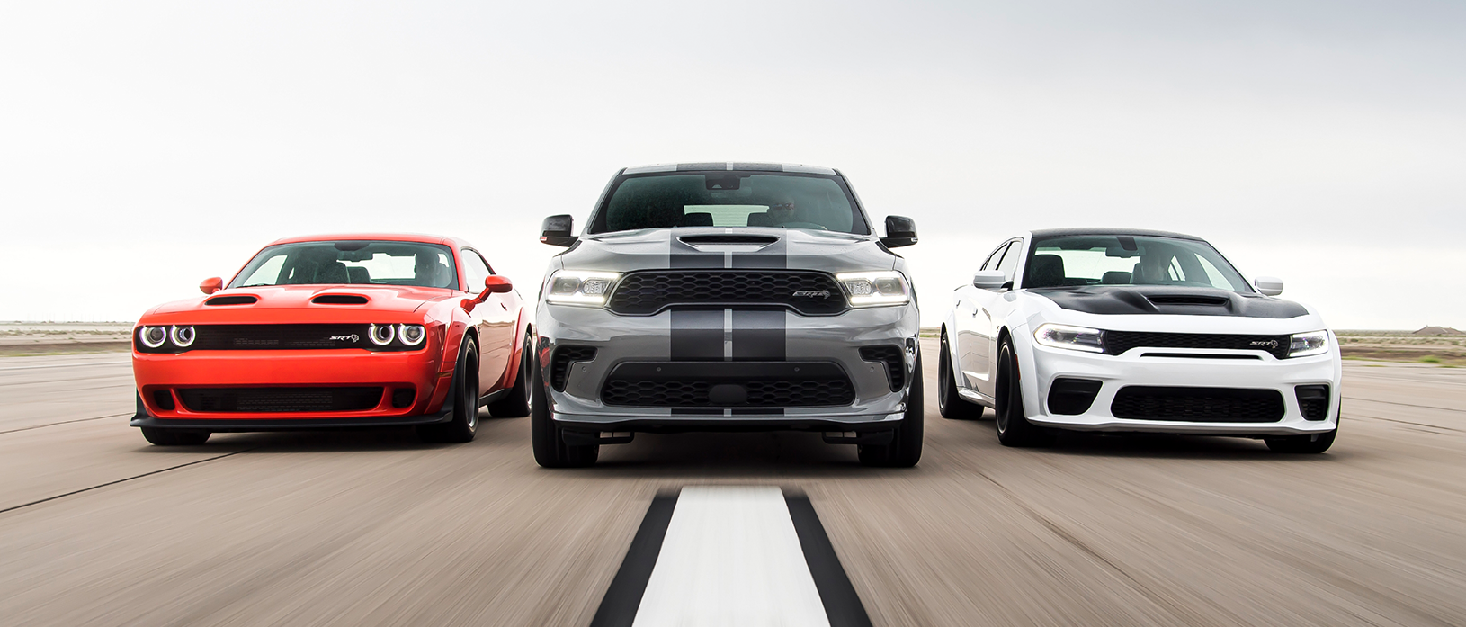 Dodge vehicles on a road