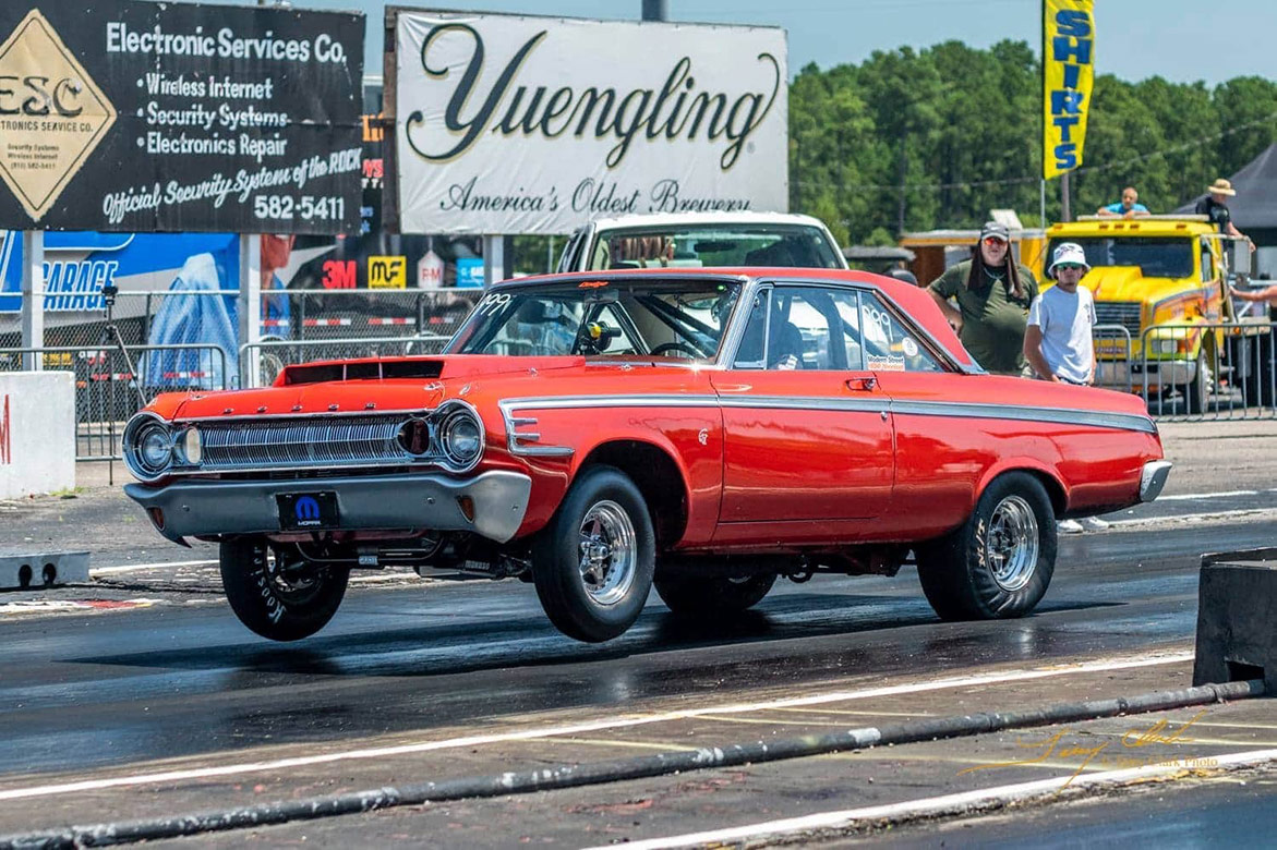 dodge vehicle on a drag strip