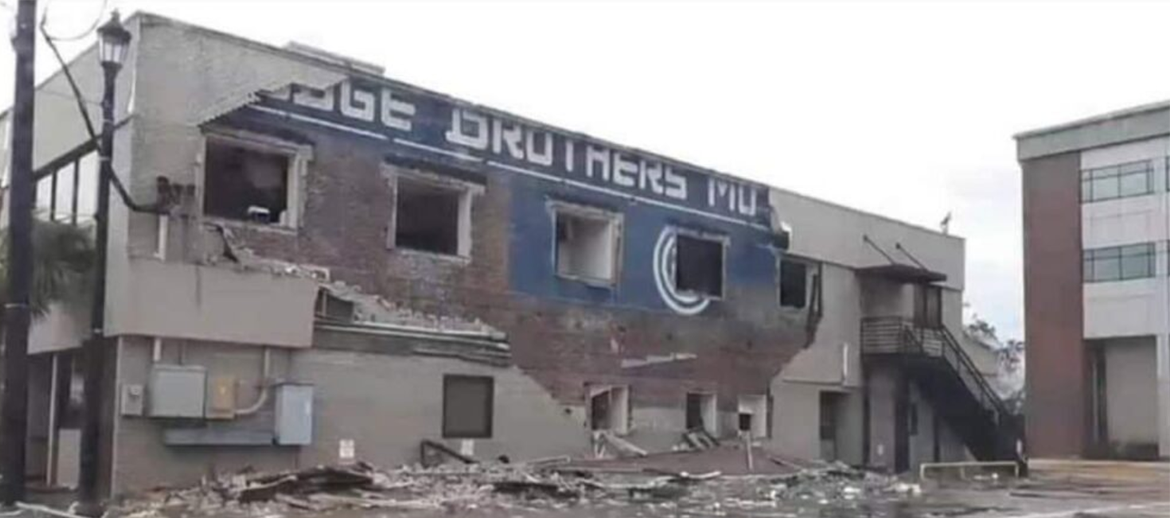 Painted signage on destroyed building