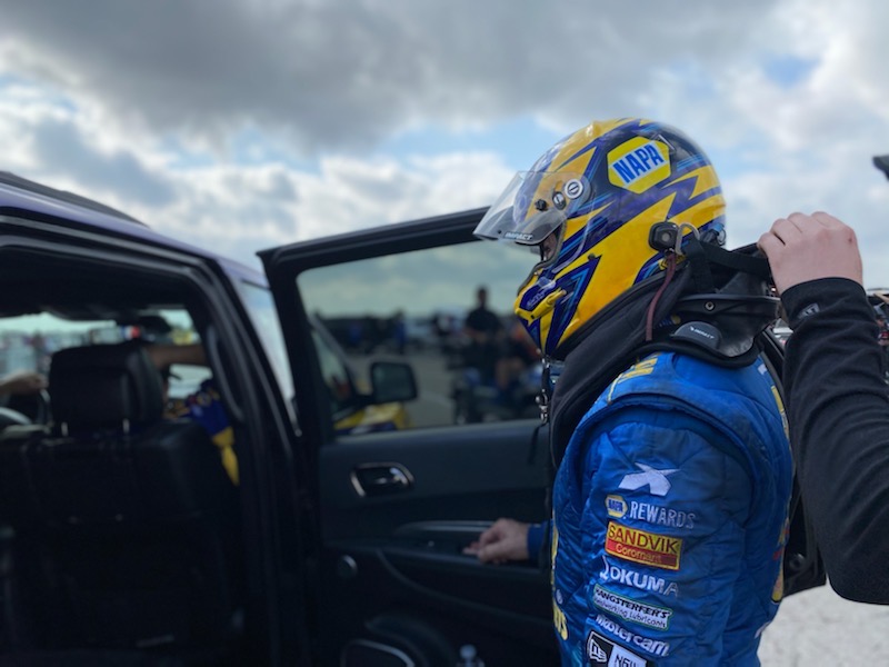 Ron Capps suiting up to race