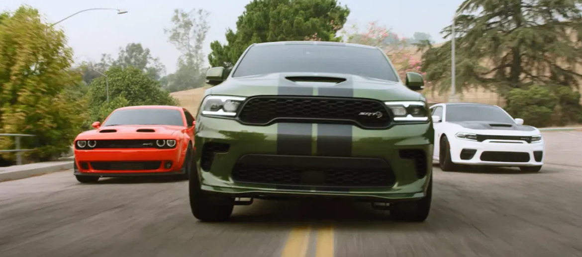 Dodge Charger, Dodge Challenger and Dodge Durango driving on the road