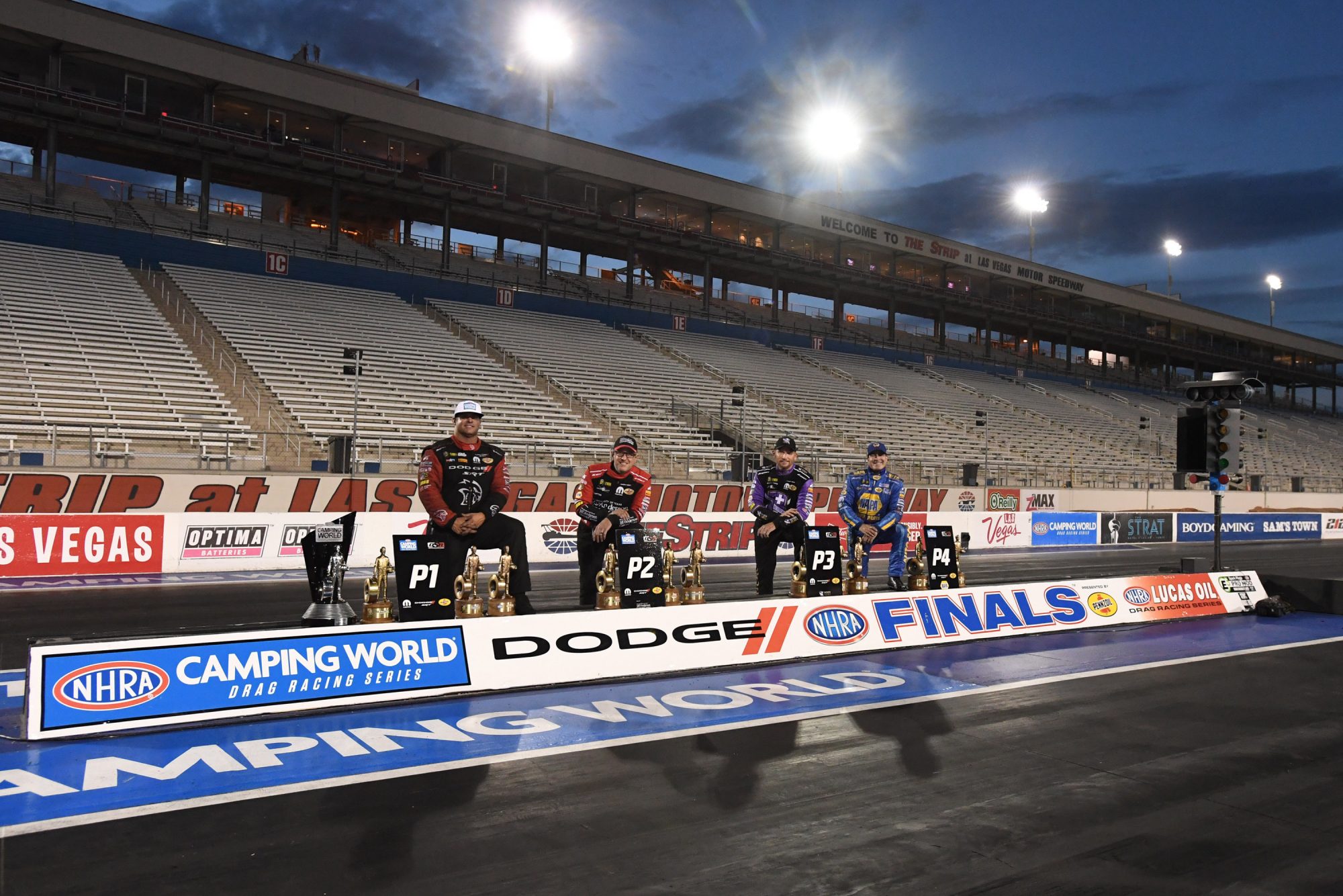 DSR funny car drivers with their trophies