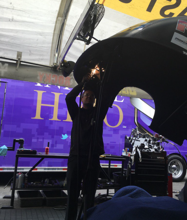 Alex Conaway working on a funny car