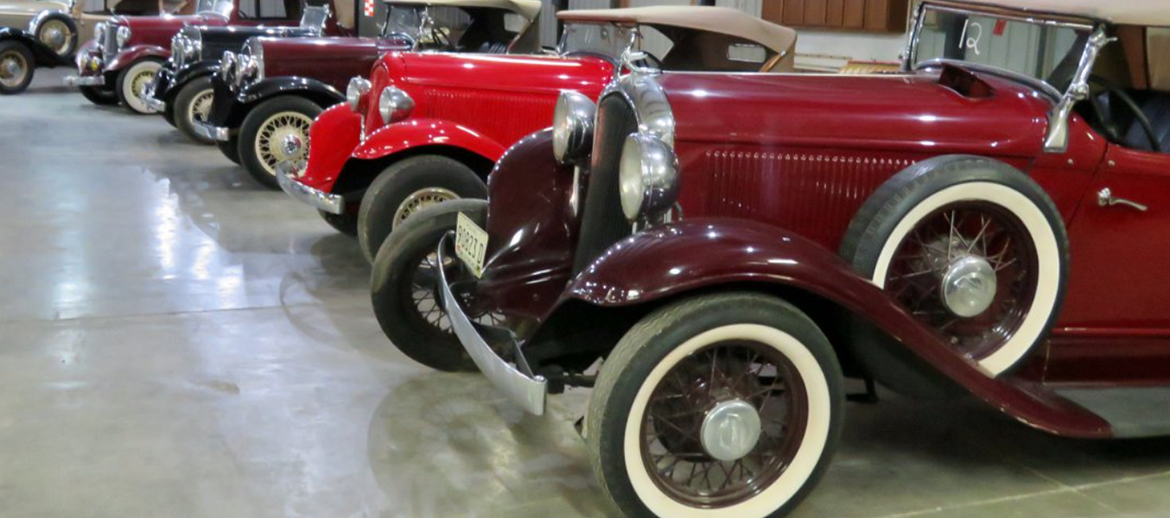 Room full of classic vehicles
