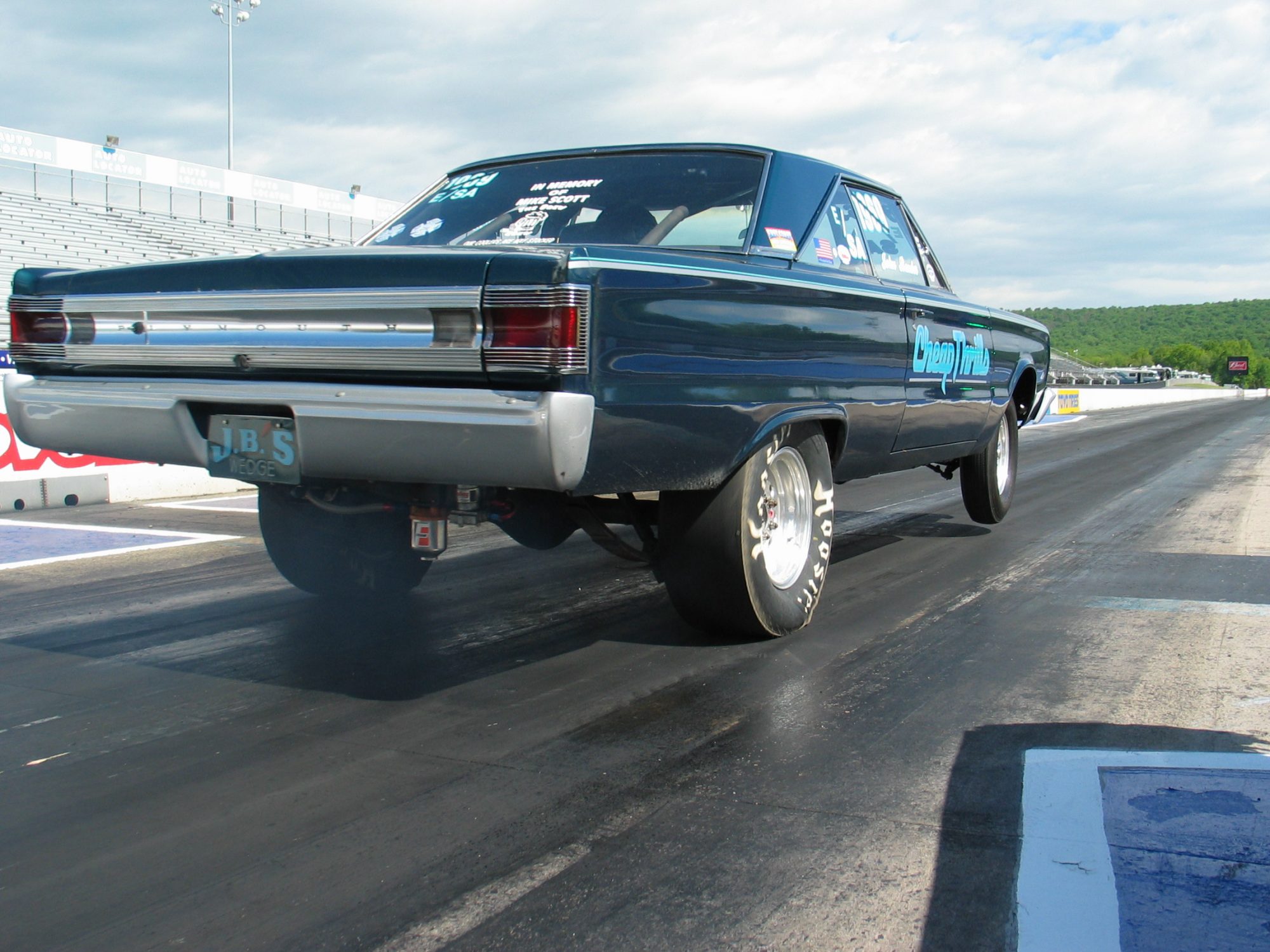 1967 Plymouth Satellite launching off the start line